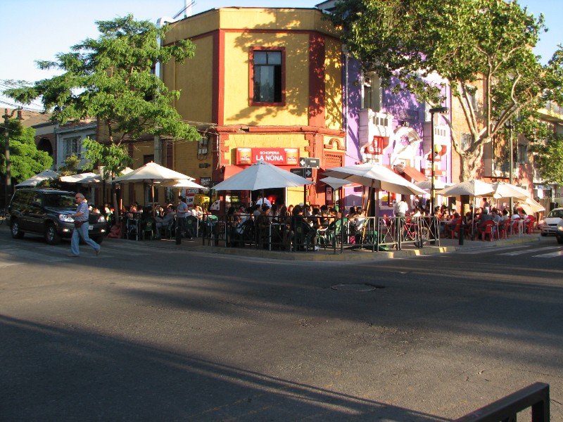 IMG_5735.jpg - Bellavista Street corner filled with people relaxing with a snack and drinks.