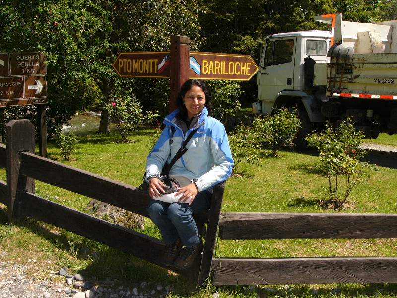 P1080711.JPG - Sitting on the fence. Puerto Montt (Chile) to the left, Bariloche (Argentina) to the right.