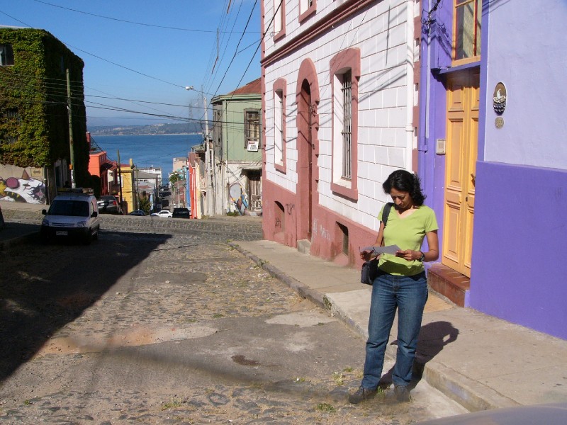 P1090338.JPG - Orienting oneself outside Luna Sonrisa, a bright and colourful hostel in the heart of historic Cerro Alegre.